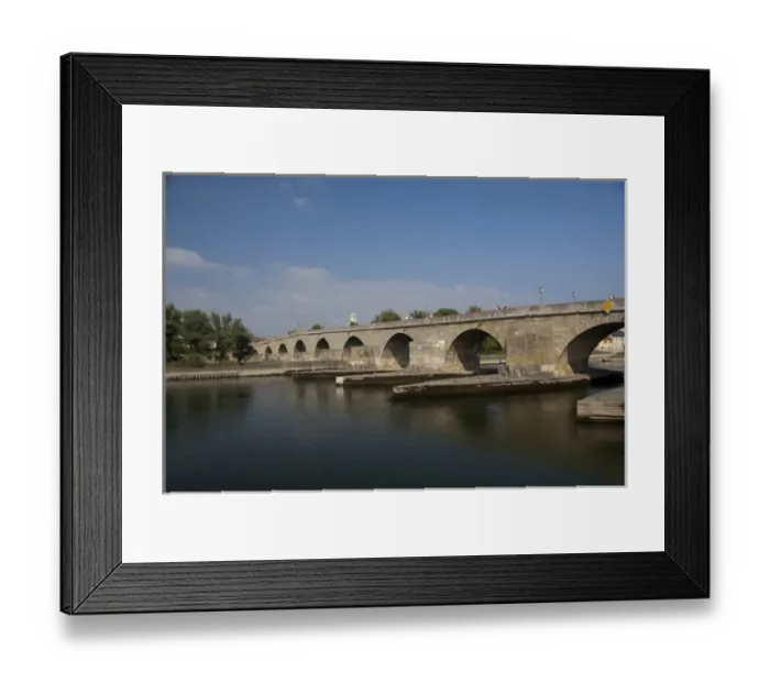 Framed Print : Germany, Bavaria, Regensburg. Historic landmark 12th century Stone Bridge Framed Print : Germany, Bavaria, Regensburg. Historic landmark 12th century Stone Bridge