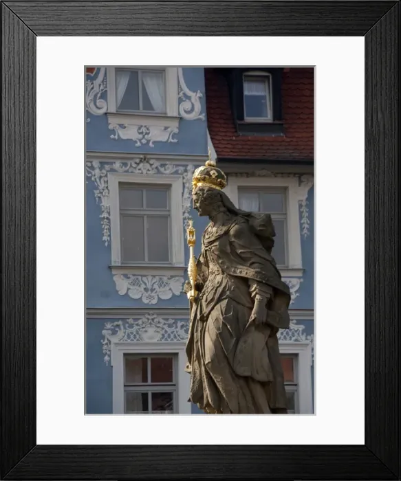 Framed Print : Germany, Bamberg. Royal statue of Kaiserin Kunigund in front of ornate blue & white Framed Print : Germany, Bamberg. Royal statue of Kaiserin Kunigund in front of ornate blue & white