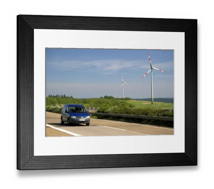 Framed Print : Electricity wind generators and automobiles traveling on the autobahn in northwest Framed Print : Electricity wind generators and automobiles traveling on the autobahn in northwest