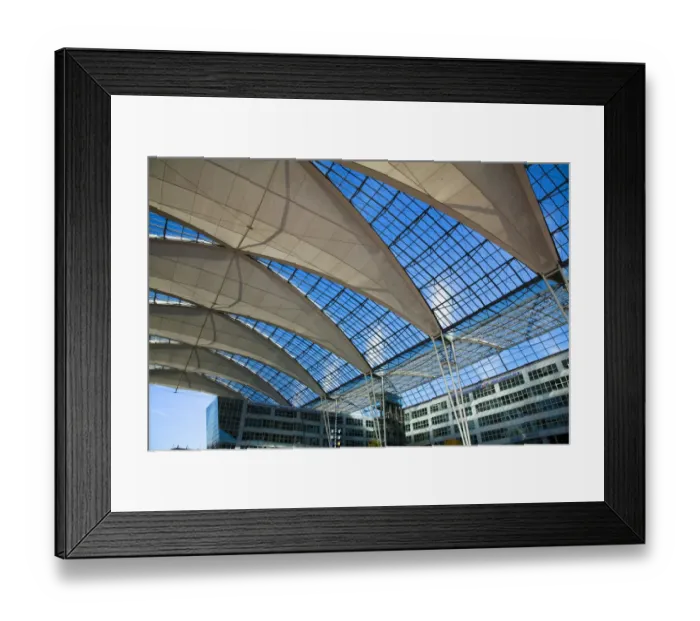 Framed Print : Frankfurt, Brandenburg, Germany - An open air area covered by glass and fabric in an airport Framed Print : Frankfurt, Brandenburg, Germany - An open air area covered by glass and fabric in an airport