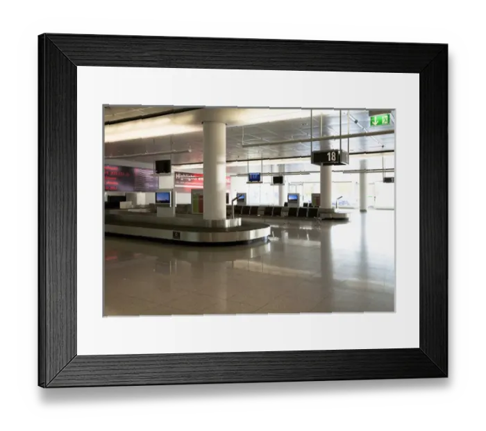 Framed Print : Frankfurt, Brandenburg, Germany - An empty baggage carousel in the arrivals section of an airport Framed Print : Frankfurt, Brandenburg, Germany - An empty baggage carousel in the arrivals section of an airport