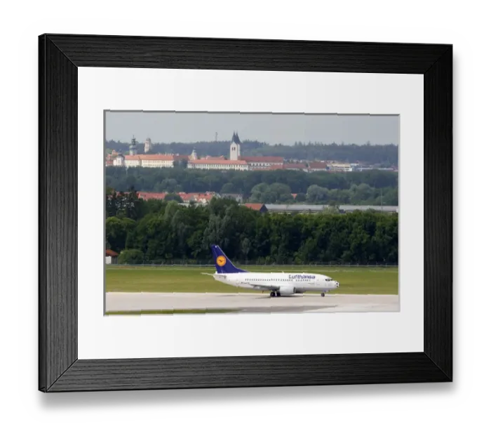 Framed Print : Lufthansa Boeing 737 airplane landing at Munich airport, Germany
