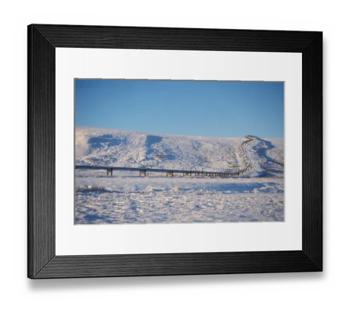 Framed Print : Alaskan pipeline on the snowy tundra of the North Slope of the Brooks Range, central