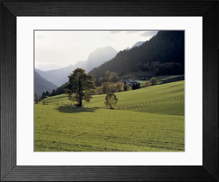 Framed Print : Germany, Bavaria, Ramsau. A cluster of farm houses nestle at the base of a hill near Ramsau Framed Print : Germany, Bavaria, Ramsau. A cluster of farm houses nestle at the base of a hill near Ramsau
