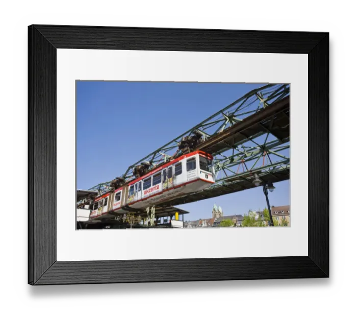 Framed Print : GERMANY, Nordrhein-Westfalen, Ruhr Basin, Wuppertal. Schwebebahn suspended tram line