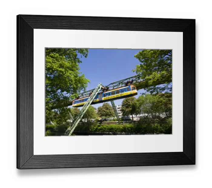Framed Print : GERMANY, Nordrhein-Westfalen, Ruhr Basin, Wuppertal. Schwebebahn suspended tram line