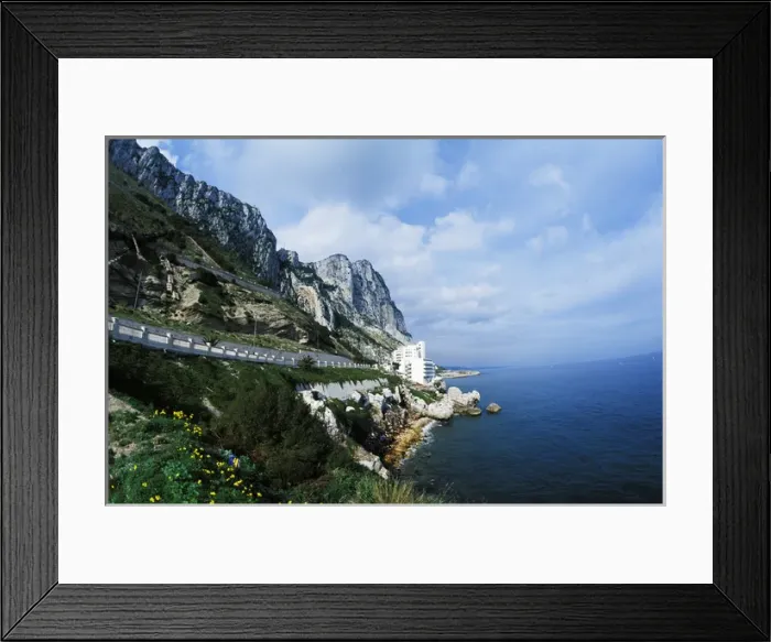 Framed Print : Famous Rock of Gibraltar with Mediterranean cliffs in Gibraltar, U. K. Country Framed Print : Famous Rock of Gibraltar with Mediterranean cliffs in Gibraltar, U. K. Country