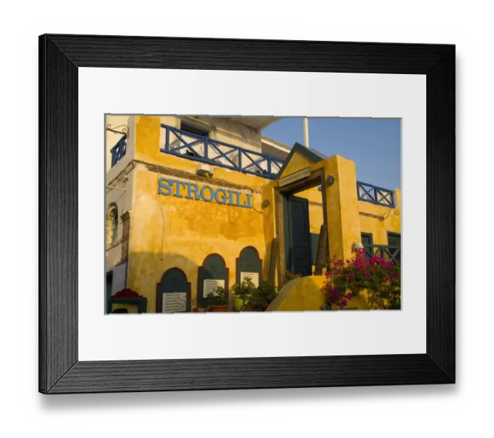 Framed Print : Oia Santorini Greece and a colorful yellow building Framed Print : Oia Santorini Greece and a colorful yellow building