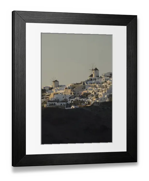 Framed Print : Greece, Cyclades, Island of Santorini (aka Thira) cliff top homes & typical windmill