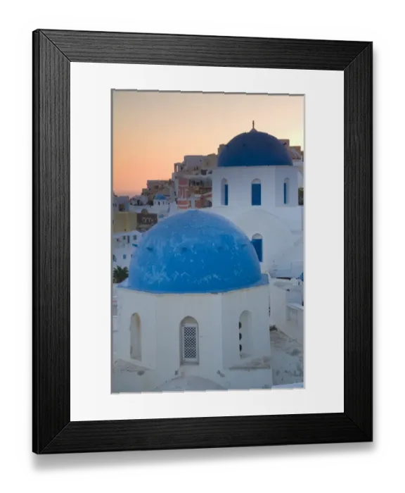 Framed Print : Greece and Greek Island of Santorini town of Oia with Blue Domed Churches with white