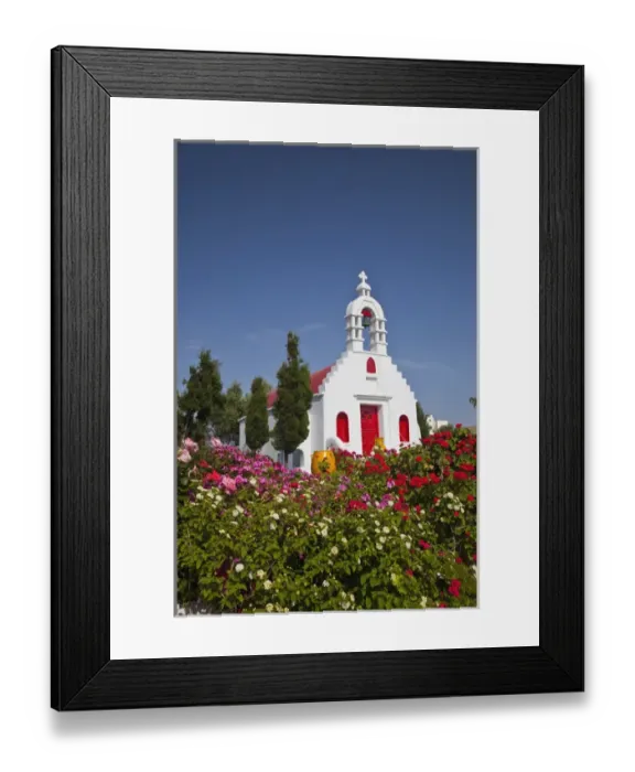 Framed Print : Europe, Greece, Greek Island, Mykonos, Chapel with red door and colorful plantings Framed Print : Europe, Greece, Greek Island, Mykonos, Chapel with red door and colorful plantings
