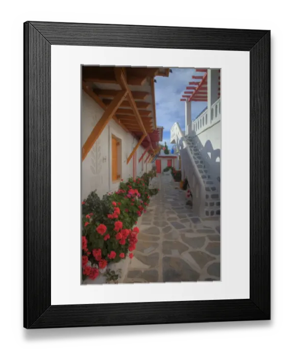 Framed Print : Europe, Greece, Greek Island, Mykonos, Color but old refurishing hotel in central