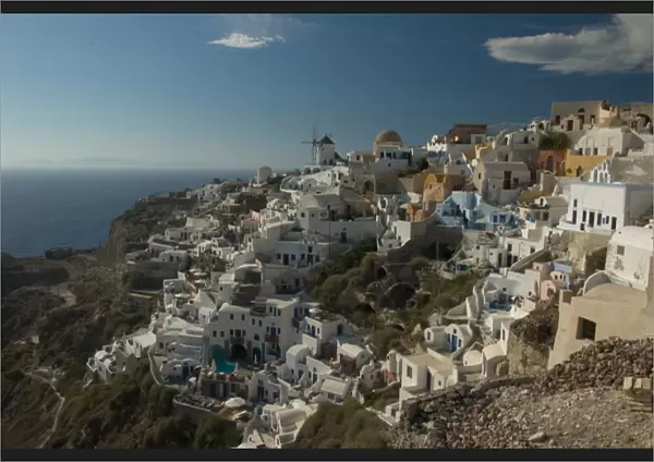 Europe, Greece, Cyclades, Santorini: the villge of Oia perches atop a clifftop overlooking