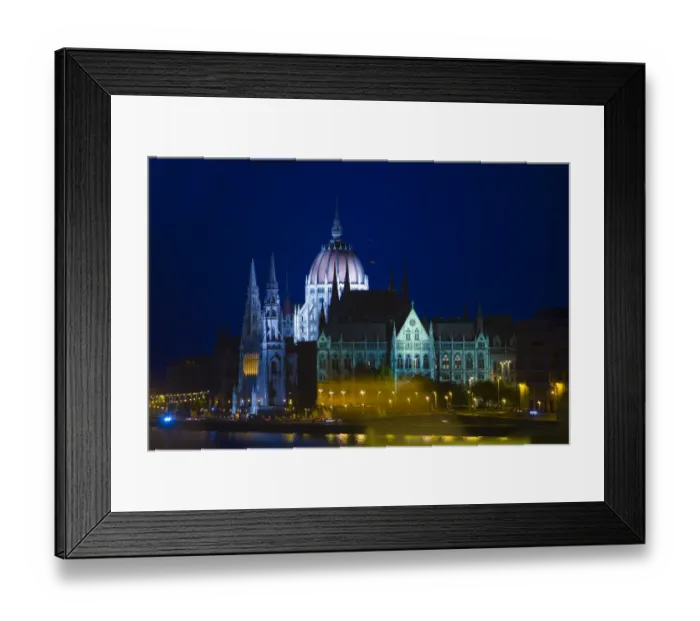 Framed Print : Europe, Hungary, Budapest. Nighttime overview of the Parliament Building next to River Danube Framed Print : Europe, Hungary, Budapest. Nighttime overview of the Parliament Building next to River Danube