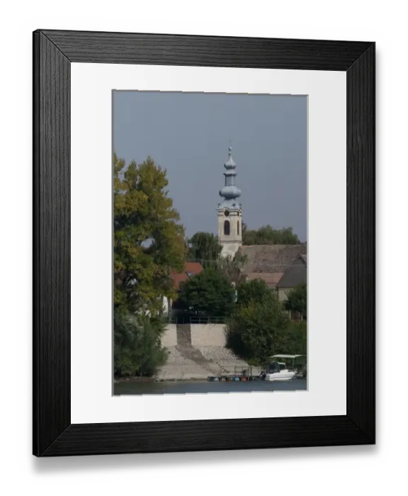 Framed Print : Hungary. Danube River view near Kalocsa. Typical waterfront village with clock tower Framed Print : Hungary. Danube River view near Kalocsa. Typical waterfront village with clock tower