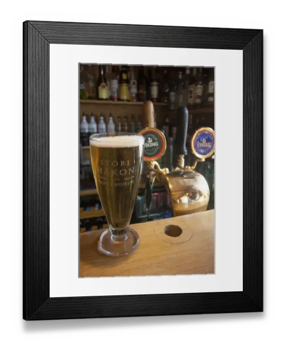 Framed Print : ICELAND21505_JUL2009_BARTRUFF. CR2-Local Icelandic draft beer in Husavik waterfront pub Framed Print : ICELAND21505_JUL2009_BARTRUFF. CR2-Local Icelandic draft beer in Husavik waterfront pub