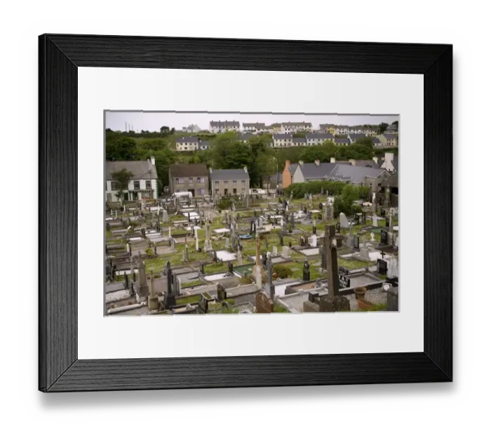 Framed Print : Europe, Ireland, Adara. High overview of the church cemetery and village houses. Credit as Framed Print : Europe, Ireland, Adara. High overview of the church cemetery and village houses. Credit as