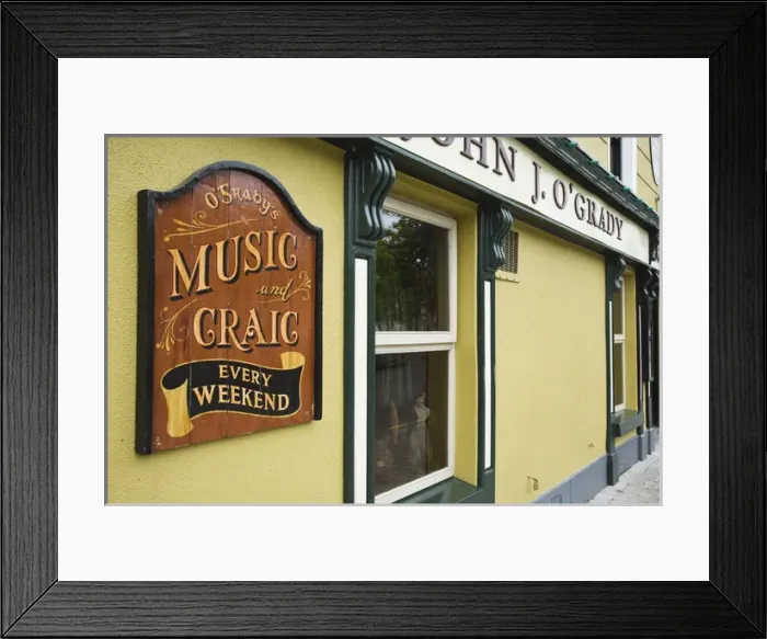 Framed Print : Irieland, Westport. Sign advertises fun and music at a traditional pub Framed Print : Irieland, Westport. Sign advertises fun and music at a traditional pub