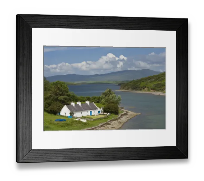 Framed Print : Ireland, Claggan. A cottage sits on the bay Framed Print : Ireland, Claggan. A cottage sits on the bay