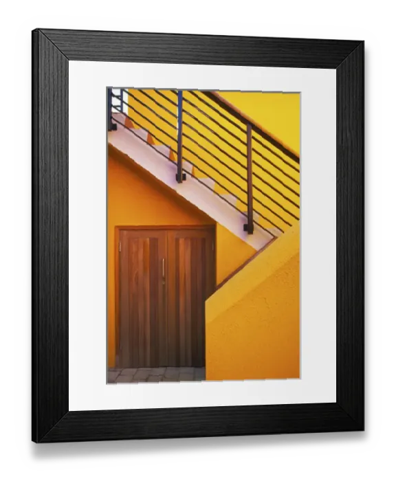 Framed Print : A small door at the bottom of a stairway in southern Ireland