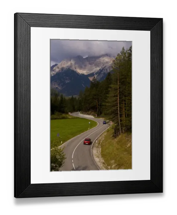 Framed Print : Windy road traveling near the village of Dobbiaco in the Italian Dolomites mountains Framed Print : Windy road traveling near the village of Dobbiaco in the Italian Dolomites mountains