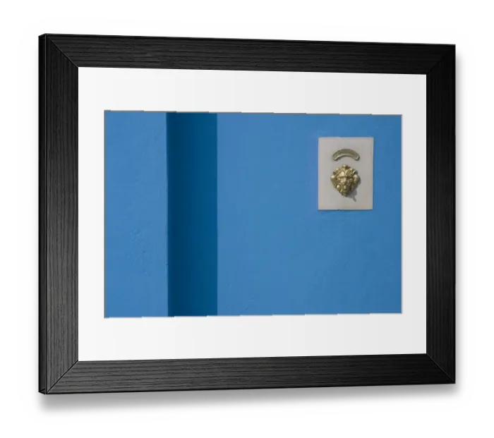 Framed Print : Europe, Italy, Burano. Blue wall and doorbell button within a brass lions head