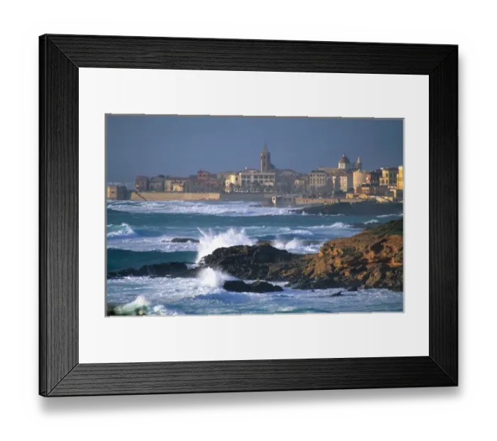 Framed Print : Waves crash on the coast at Alghero, Sardinia, Italy. roman, ancient, historical