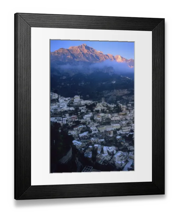 Framed Print : EU, Italy, Positano. Sun hits the mountain peaks behind Positano, Italy along Framed Print : EU, Italy, Positano. Sun hits the mountain peaks behind Positano, Italy along