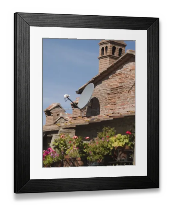 Framed Print : Italy, Cortona, Satelite TV dishes contrast with older houses Framed Print : Italy, Cortona, Satelite TV dishes contrast with older houses