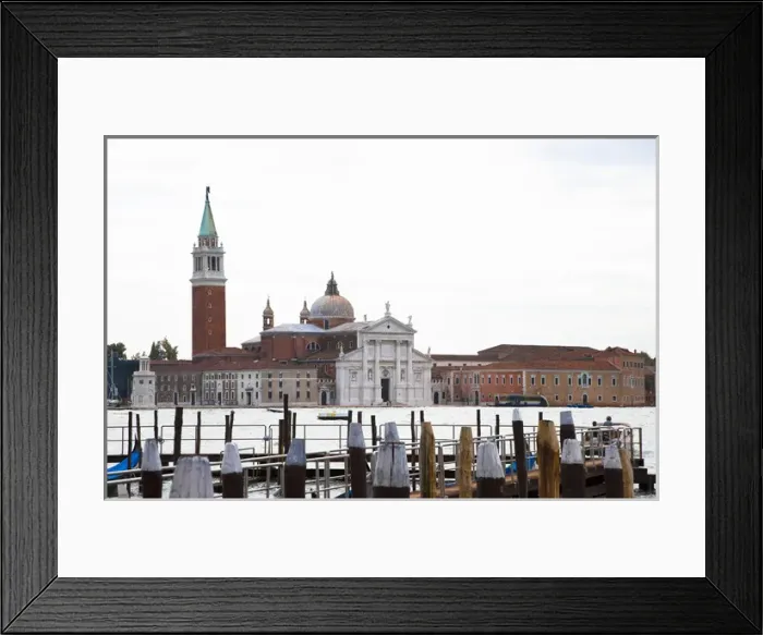Framed Print : Venice, Veneto, Italy - A church can be seen across the water from a marina dock