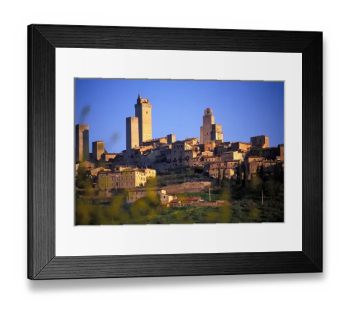 Framed Print : The village of San Gimignano sits in the rolling hills of Tuscany, Italy Framed Print : The village of San Gimignano sits in the rolling hills of Tuscany, Italy