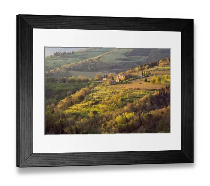 Framed Print : Sunlight touches the stone buildings of a farm on the rolling hills near the rural Framed Print : Sunlight touches the stone buildings of a farm on the rolling hills near the rural