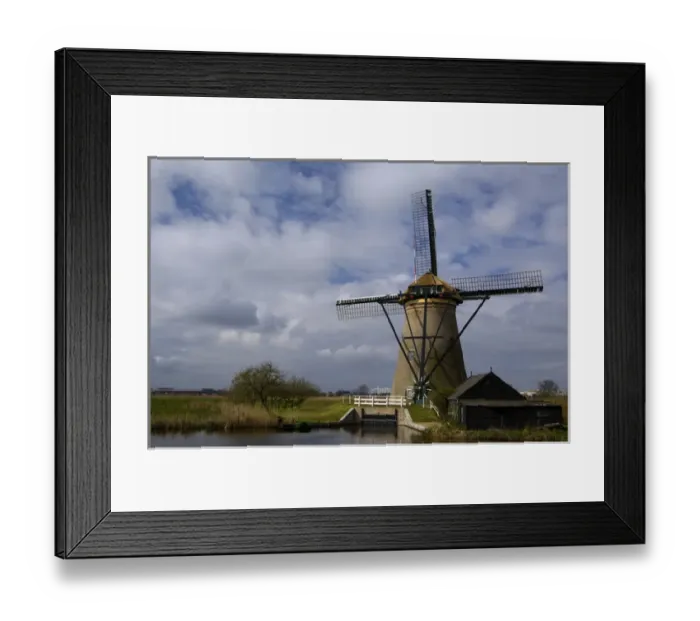 Framed Print : Netherlands (aka Holland), Kinderdijk. 19 historic windmills situated at the convergence Framed Print : Netherlands (aka Holland), Kinderdijk. 19 historic windmills situated at the convergence