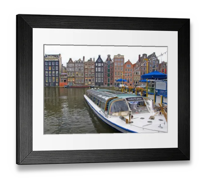 Framed Print : A tour boat waiting at Rederij Plas dock on a canal lined with colorful gabled homes Framed Print : A tour boat waiting at Rederij Plas dock on a canal lined with colorful gabled homes