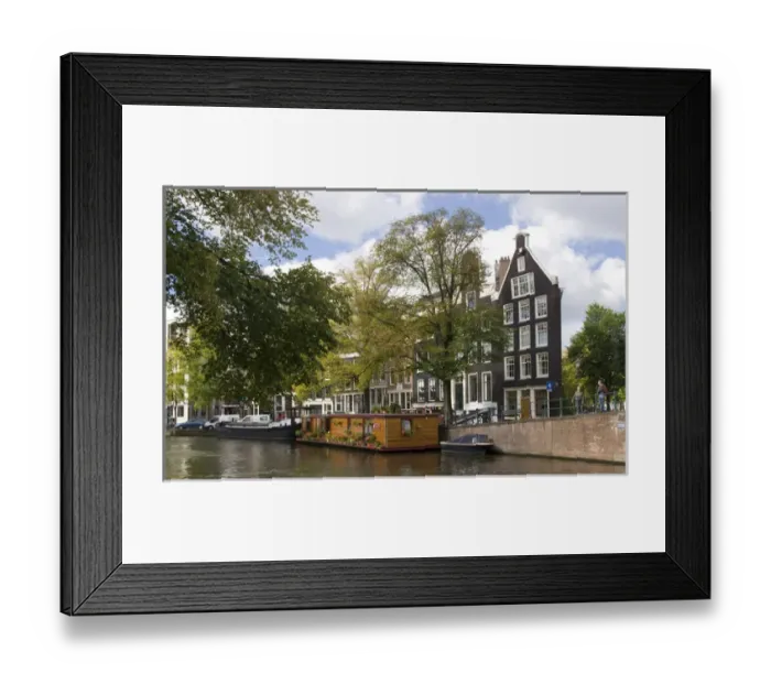 Framed Print : A wooden houseboat with lots o fplants on Prinsengracht Canal Framed Print : A wooden houseboat with lots o fplants on Prinsengracht Canal