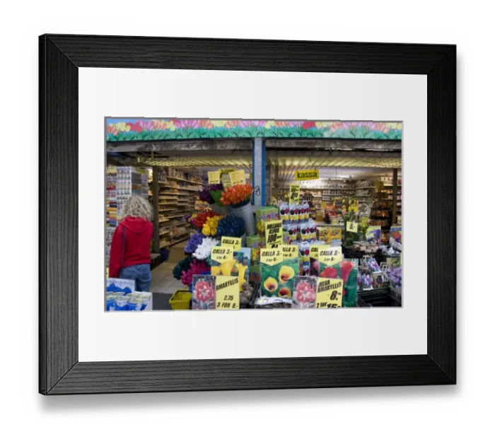 Framed Print : A bulb and souvenir shop with people at Bloemenmarket