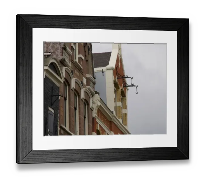 Framed Print : Hooks hanging from brick building in Amsterdam for pully system Framed Print : Hooks hanging from brick building in Amsterdam for pully system