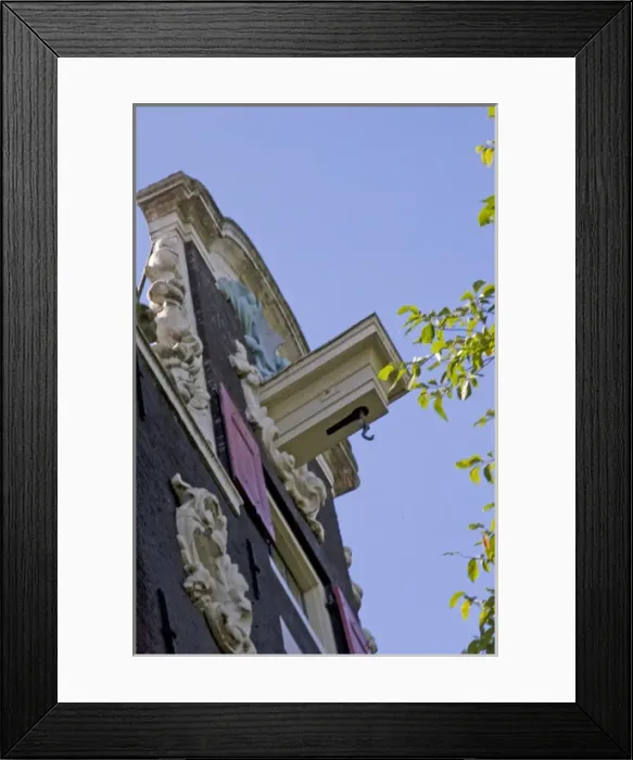 Framed Print : Colorful bulding facade with gable and hook in Amsterdam Framed Print : Colorful bulding facade with gable and hook in Amsterdam