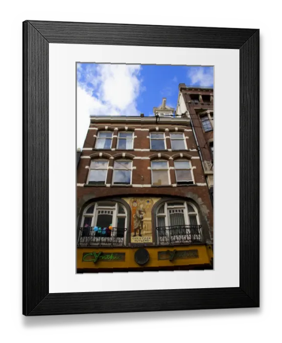 Framed Print : An ornate building decorated with a mosaic of tiles of Christiaan Huygens, the Dutch