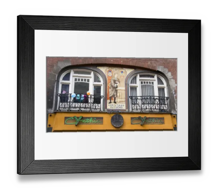 Framed Print : An ornate building decorated with a mosaic of tiles of Christiaan Huygens, the Dutch