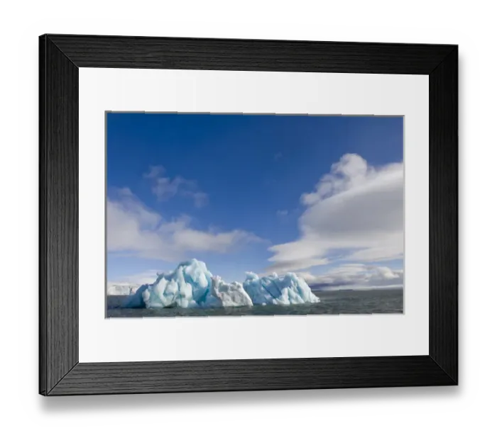Framed Print : Norway, Svalbard, Nordaustlandet, Deep blue iceberg floating in Palanderbukta Bay Framed Print : Norway, Svalbard, Nordaustlandet, Deep blue iceberg floating in Palanderbukta Bay