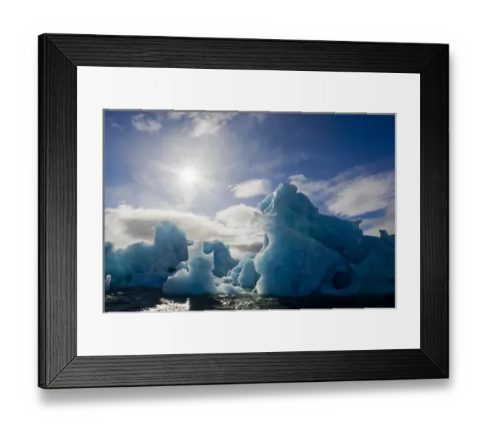 Framed Print : Norway, Svalbard, Nordaustlandet, Deep blue iceberg floating in Palanderbukta Bay
