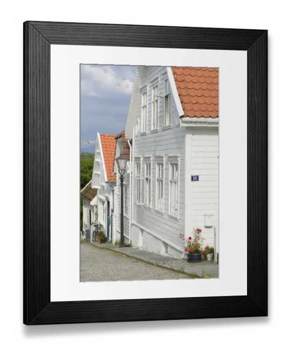 Framed Print : Coble stone Streets and white timber houses of the Stavanger Historical district Framed Print : Coble stone Streets and white timber houses of the Stavanger Historical district