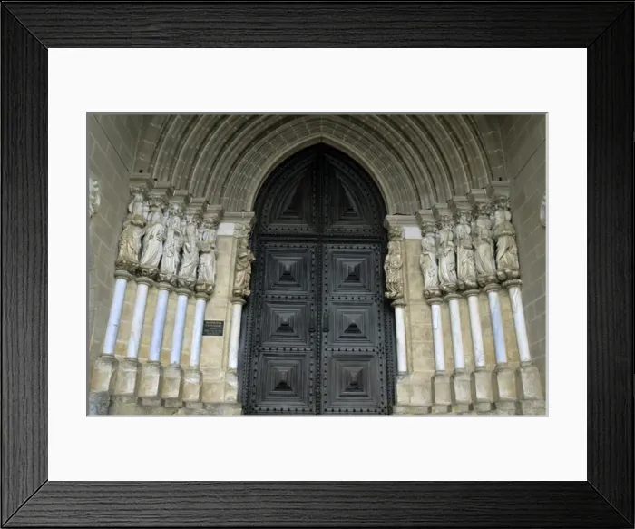 Framed Print : Europe, Portugal, Evora. Carved figures of the Apostles adorn the gothic entrance