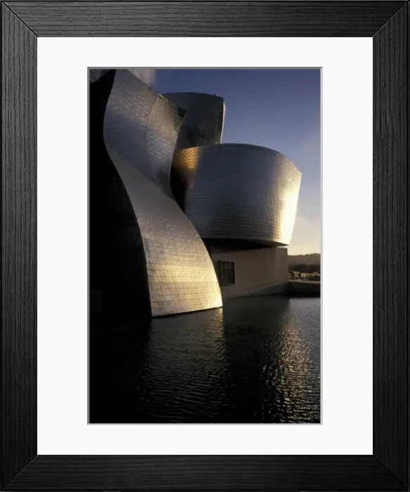 Framed Print : Europe, Spain, Bilbao Guggenheim Museum on the shore of the Nervion River. Designed by Frank O Framed Print : Europe, Spain, Bilbao Guggenheim Museum on the shore of the Nervion River. Designed by Frank O
