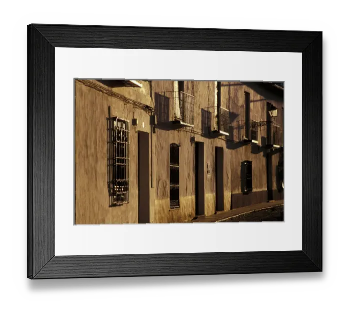 Framed Print : Spain, Almagro, Castile-La Mancha Cobblestone street with traditional houses Framed Print : Spain, Almagro, Castile-La Mancha Cobblestone street with traditional houses