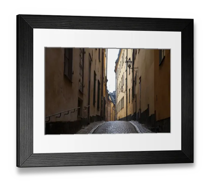 Framed Print : Stockholm, Sweden - A narrow alley going between two old world buildings. Horizontal shot Framed Print : Stockholm, Sweden - A narrow alley going between two old world buildings. Horizontal shot