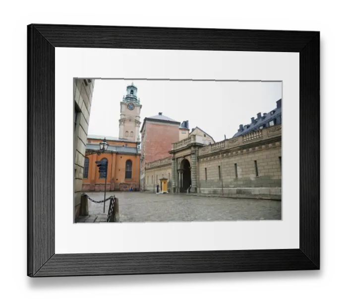 Framed Print : Stockholm, Sweden - An old world road and buildings. There is a chained off area
