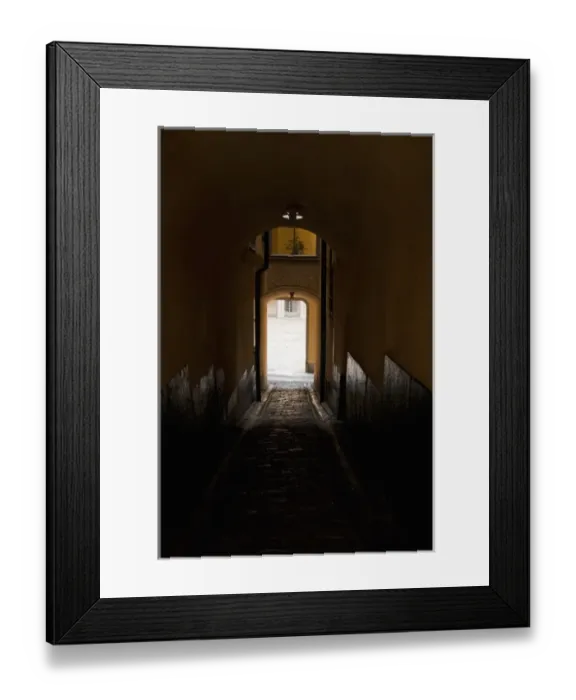 Framed Print : Stockholm, Sweden - Image of a dark, enclosed walkway. Sunlight can be seen from the arched exit Framed Print : Stockholm, Sweden - Image of a dark, enclosed walkway. Sunlight can be seen from the arched exit
