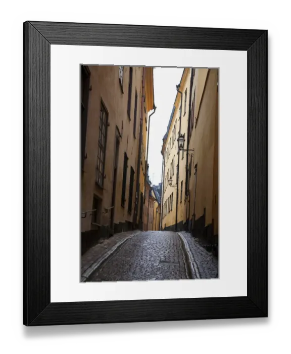 Framed Print : Stockholm, Sweden - A narrow alley going between two old world buildings. Vertical shot